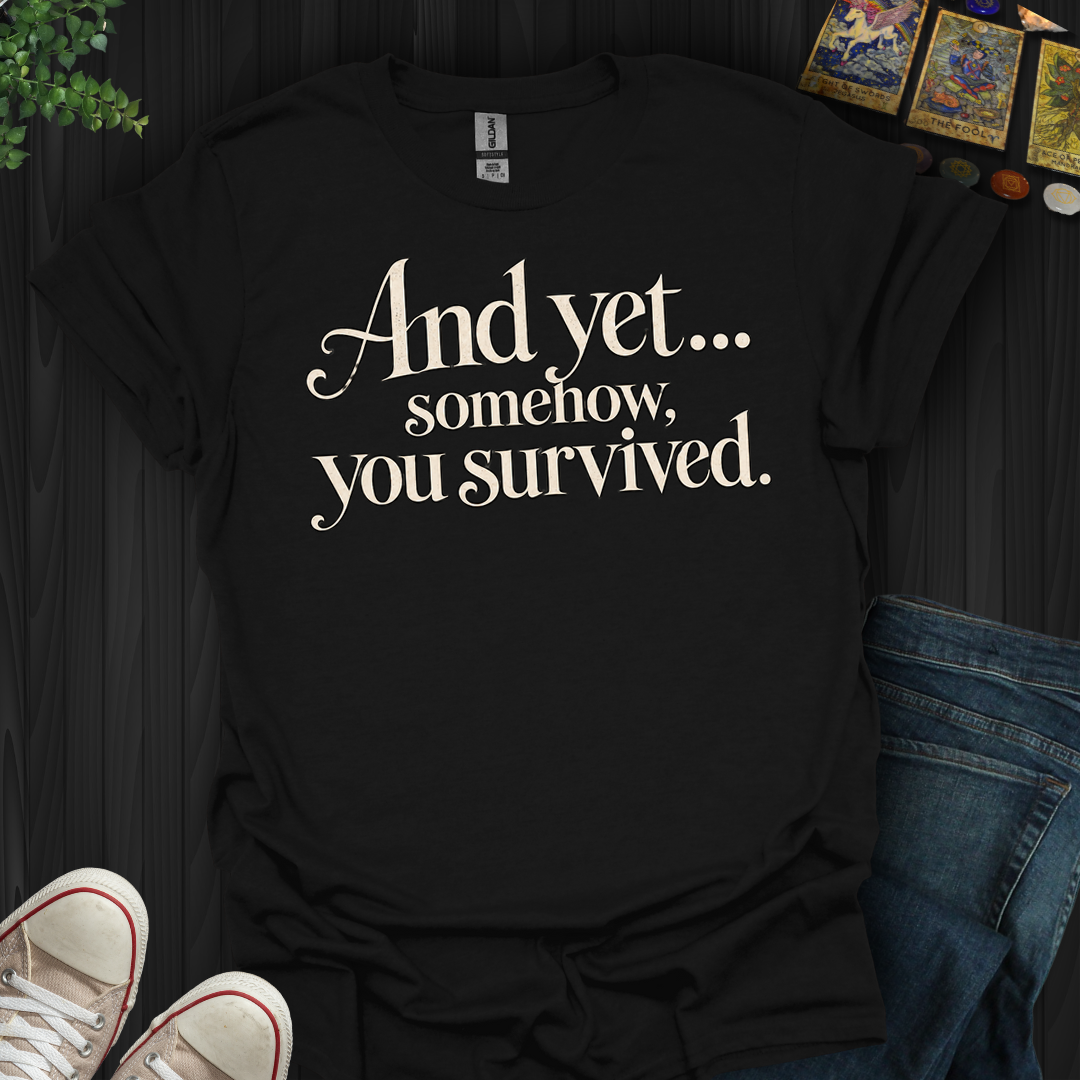 Somehow You Survived- T-Shirt