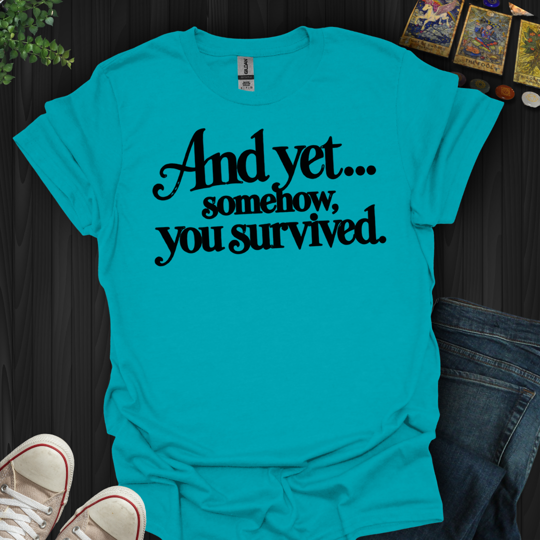 Somehow You Survived- T-Shirt